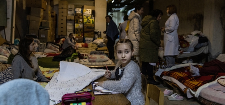 A Ukrainian girl draws in a bomb shelter at the Okhmadet Children's Hospital on March 01, 2022 in Kyiv. Chris McGrath/Getty Images