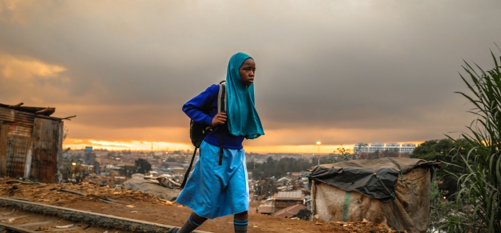 A girl finds her way to school on an early morning in Kibera Slums. Image: Donwilson Odhiambo/SOPA Images/LightRocket/Getty
