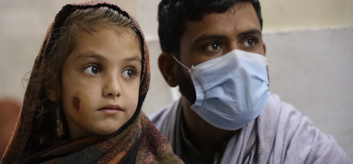 A young girl is at MSF’s cutaneous leishmaniasis treatment center with her uncle at Naseerullah Khan Babar memorial hospital, Peshawar. Nov. 1, 2020 Image by Nasir Ghafoor/Courtesy of MSF 