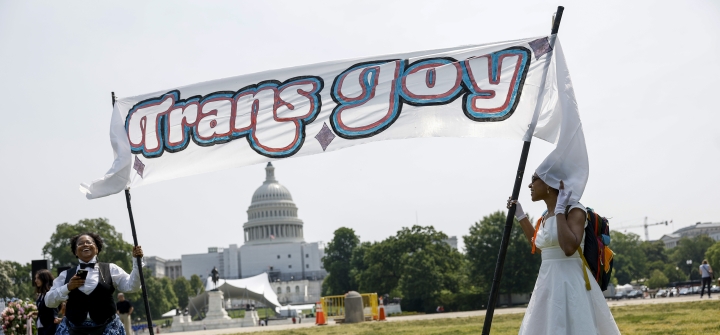 Activists hold a banner up before the start of the "Trans Youth Prom" outside of the US Capitol building on May 22, 2023 in Washington, DC. Anna Moneymaker/Getty