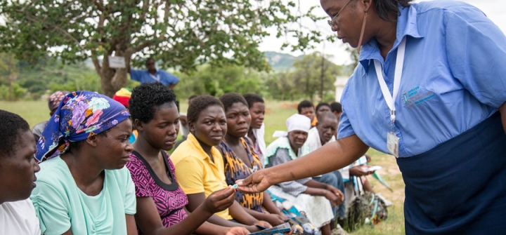 Marie Stopes International nurse Eve Chirengwa shows a client a contraceptive implant during a group counselling session.