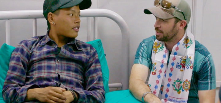 Chris Bombardier (right), a winner of the 2018 Untold Global Health Stories contest, visiting a hospital on a trip to Nepal