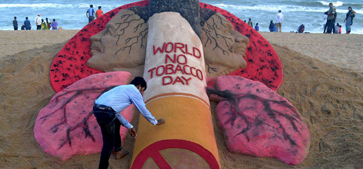 Indian artist Sudarsan Pattnaik creating a sand sculpture for World No Tobacco Day at Puri beach. On the last day of May each year, the WHO and partners mark World No Tobacco Day, highlighting the health risks associated with tobacco use and advocating for effective policies to reduce tobacco consumption.