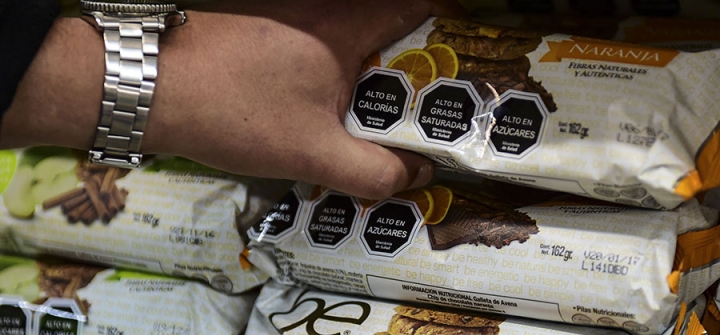 Cookies with labels stating their high content in sugar, calories and saturated fat in Santiago, Chile, on June 20, 2016. Image: Martin Bernetti/AFP/Getty  