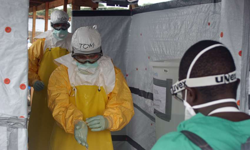 Tom Frieden visits an Ebola treatment unit in Monrovia in 2014. (Courtesy: Resolve to Save Lives)
