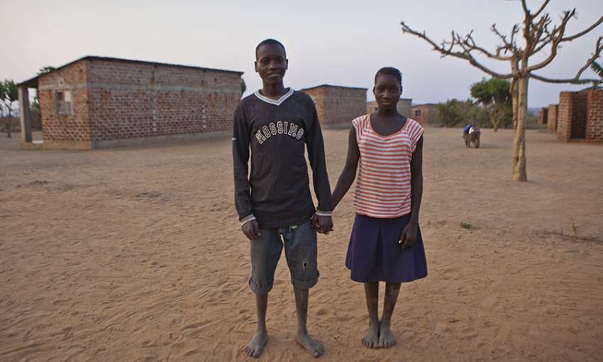 Itayi, 16, and Alice, 13, serve as youth ambassadors raising awareness of HIV in in Mozambique. Image: In Pictures Ltd./Corbis via Getty Images