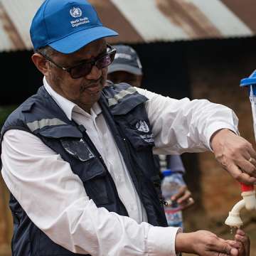WHO Director-General Tedros Adhanom Ghebreyesus washes his hands before visiting an Ebola treatment center in Itipo on June 11, 2018.