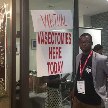 The World Vasectomy Day "clinic" at the International Conference on Family Planning in Kigali, Rwanda seemed to attract more passerby after adding the word "Virtual" above their sign. 