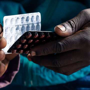 A patient holds a packet of tablets received as part of his treatment at Rutsanana Polyclinic in Glen Norah township, Harare, Zimbabwe, June 24, 2019.  Image: Jekesai Njikizana/AFP/Getty 