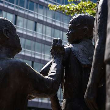 A statue representing a child receiving a vaccine in front of the WHO headquarters in Geneva, amid the COVID-19 outbreak, April 24, 2020. Image: Fabrice Coffrini/AFP/Getty