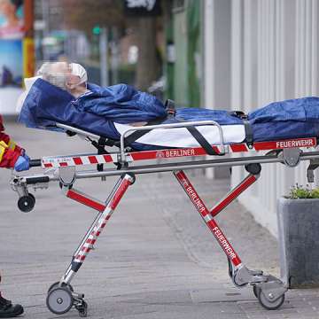 An elderly man is wheeled out of a nursing home on April 2, 2020 in Berlin, Germany. Image: Sean Gallup/Getty