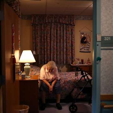 Jeanne Fregeau, 93 waits for her morning medication in her room at St. Chretienne Retirement Residence, a home for Catholic nuns in Marlborough, MA on August 26, 2020.  Image: Craig F. Walker/The Boston Globe/Getty