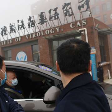Members of the WHO team investigating the origins of COVID-19 arrive at the Wuhan Institute of Virology in Wuhan, China, Feb. 3, 2021.  Image: Hector Retamal/AFP/Getty