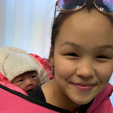 A mother and her newborn who was delivered at the Inukjuak Maternity amidst rising COVID-19 restriction in Nunavik, Quebec, September 2020. Image by Patrice Latka.