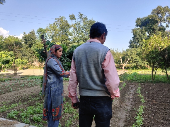 Babita Rana inspects her family-run farm, which uses natural farming methods. Himachal Pradesh, India, October 27, 2021.