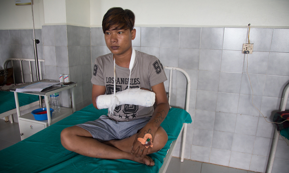 Kamal Malla, one of Dr. Rai's patients, after surgery on his hand.